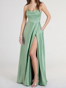 Detail of elegant sage green satin evening dress featuring a cowl neck and side slit