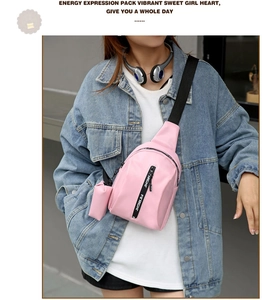 Pink nylon chest bag with adjustable strap and small coin purse shown on a model