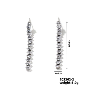 Detailed view showing 4.9cm long vintage dangle earrings with marquise-cut cubic zirconia