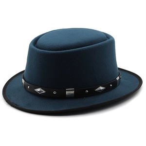 Classic dark teal wool felt bowler hat with black leather studded band and curved brim