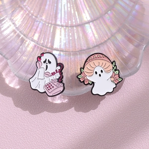 Ghost enamel pin set with white ghosts and pink flowers for Halloween accessories