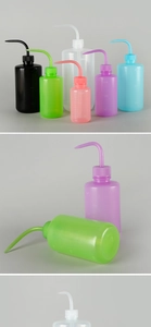 Assorted colorful plastic squeeze bottles with curved nozzles and clear volume scales
