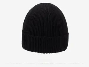Detail view of the black ribbed knit beanie back side showing thick winter fabric texture