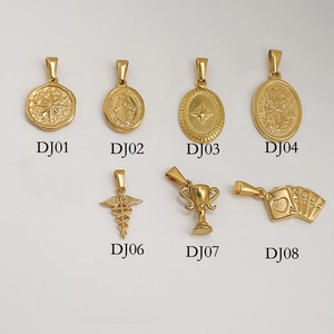 Vintage gold stainless steel pendant set featuring star, heart, and cross designs