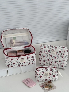 Three-piece burgundy floral corduroy makeup bag set for travel storage and skincare