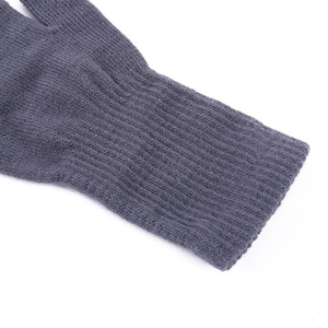 Close-up of grey acrylic knit sleeve with ribbed cuff texture for winter gloves