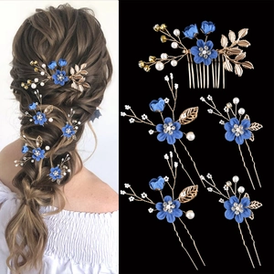 5-piece bridal flower hair clip set with blue fabric petals, pearls, and gold leaves