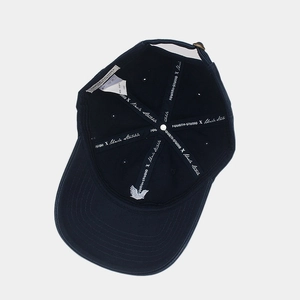 Navy cotton baseball cap with eagle embroidery and detailed interior stitching