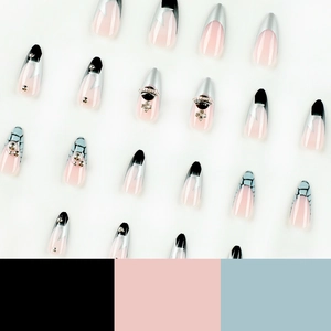 French almond press-on nails with silver star glitter and 3D cross charms