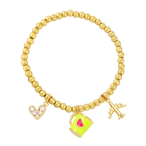 Detail of beaded gold bracelet with airplane, heart zircon and enamel cup charms