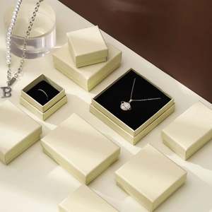 Elegant champagne gold jewelry gift boxes in various sizes for rings and necklaces