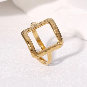 Square 18k gold plated stainless steel ring with hammered texture in a 45-degree side view