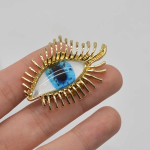Vintage Niche Design Alloy Evil Eye Brooch Personalized Blue Eye Corsage Electroplated Gold Accessory For Suit Overcoat Women