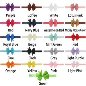 Detail showing collection of 21 colorful baby bow headbands in soft elastic fabric