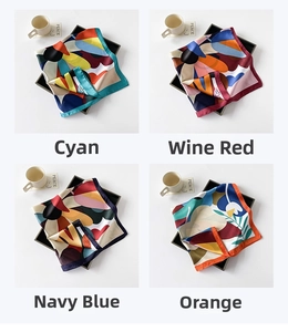 Detail of silk square scarves featuring abstract floral prints in four elegant color options