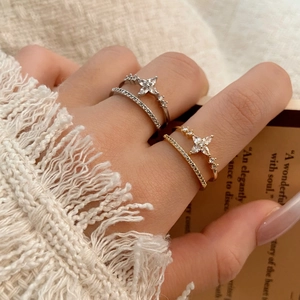 Exquisite double layer star rings in gold and silver finish with pavé crystal accents