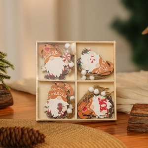 Detailed view of four painted wooden Christmas gnomes in a wooden storage box with jute rope