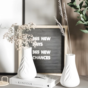 Minimalist white ceramic vase set with leaf vein texture for elegant home decor