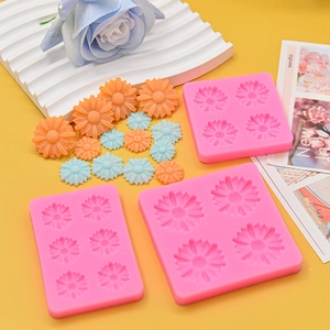 Pink daisy flower silicone molds in three sizes for fondant, soap, and DIY crafts