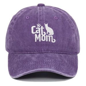 Close-up of white Cat Mom embroidery on a purple washed cotton vintage baseball cap