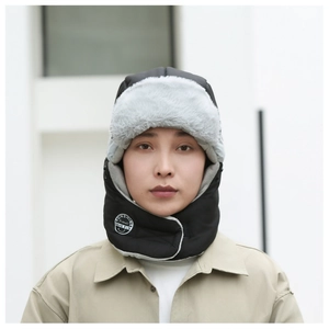 Detail shot of a winter trapper hat with thick fleece lining and neck protection