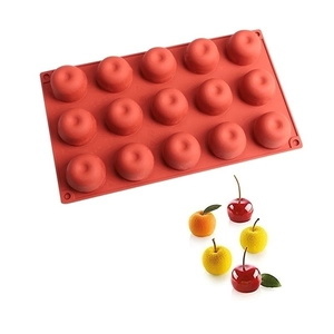 Macro detail of red silicone mold for banana jelly and 3D fruit shaped mousse cakes