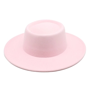 Close-up of a light pink wool felt boater hat with a flat top and wide brim design