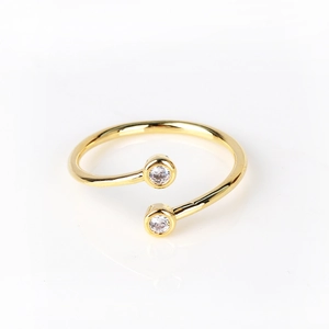 Detail of 18K gold-plated double zircon ring with an adjustable open band design