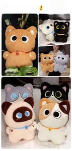 Detailed view of various plush cat toys with round bodies and colorful bell collars