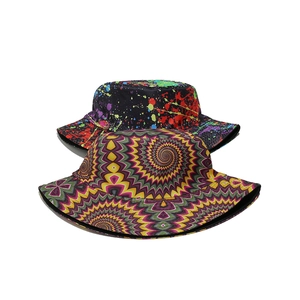 Detail view of colorful splatter paint and spiral fractal patterns on sun protection bucket hats
