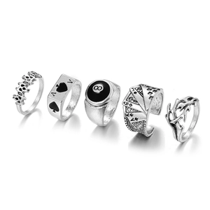 Retro silver ring set featuring skull bat crown and poker designs in Gothic style
