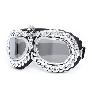 Silver punk goggles with metal cross, skull ornament, and black leather padding