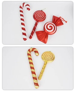 Close-up of red and gold striped Christmas candy cane and lollipop ornaments