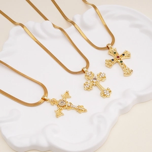 Gold cross necklaces with colorful zircon pendants on sleek flat snake chains
