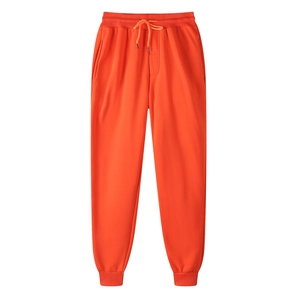 Pantaloni jogger oversize arancione acceso con coulisse in vita e polsini alle caviglie uomo
