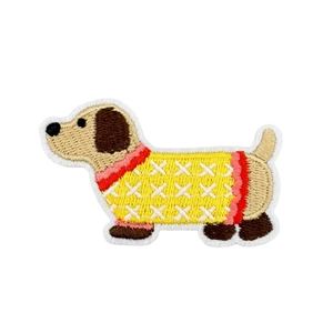 Embroidered dachshund iron-on patch wearing a yellow sweater for DIY clothing decor