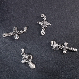Retro stainless steel gothic pendants featuring skull, cross, and spider web designs