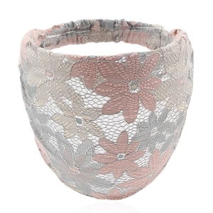 Detailed close-up showing the pink and grey floral lace texture of the wide headband