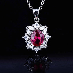 Luxurious S925 sterling silver necklace with oval red ruby pendant in snowflake setting