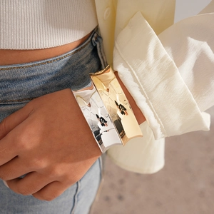 Minimalist wide geometric open cuff bracelets in polished gold and silver mirror finish