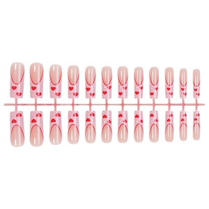 Long red heart French tip press-on nails set with 24 pieces on a pink base