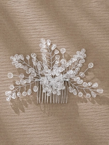 Detail view of handcrafted silver bridal hair comb with crystal beads and pearls