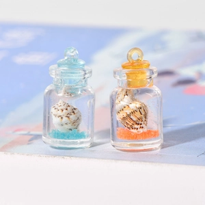 Mini bouteilles à vœux lumineuses avec sable bleu et orange et coquillages en porte-clés