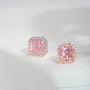Pink radiant cut gemstone halo earrings with rose gold base for a refined look