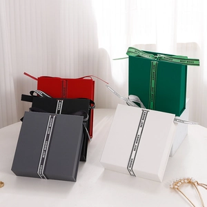 Multiple colors of square jewelry gift boxes with elegant Best Wishes ribbons