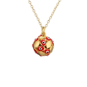 Golden necklace with red and black evil eye enamel ball pendant on white background