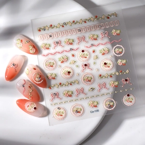 Detailed 5D embossed nail stickers featuring floral clusters and vintage bow designs