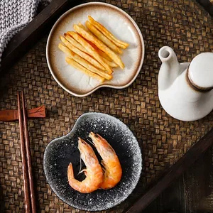 Japanese style ceramic heart-shaped snack plates set with dip pourer in rustic texture