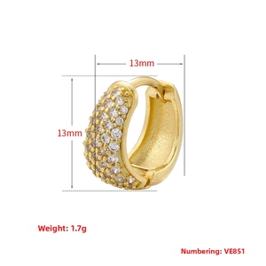 Detail of 13mm gold huggie hoop earring with micro-pave cubic zirconia crystals