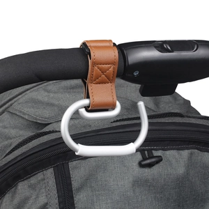 Universal stroller hook with brown leather strap and silver carabiner on gray handle